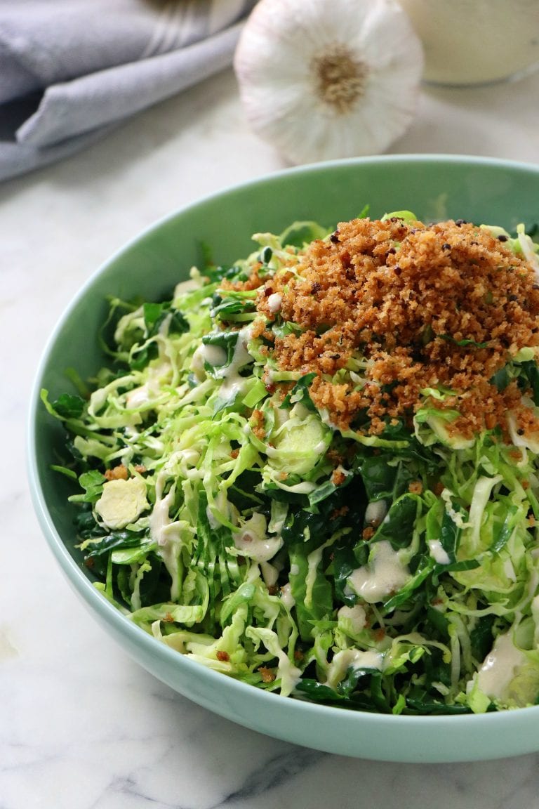Vegan Shaved Brussels Caesar Salad with Garlic Breadcrumbs