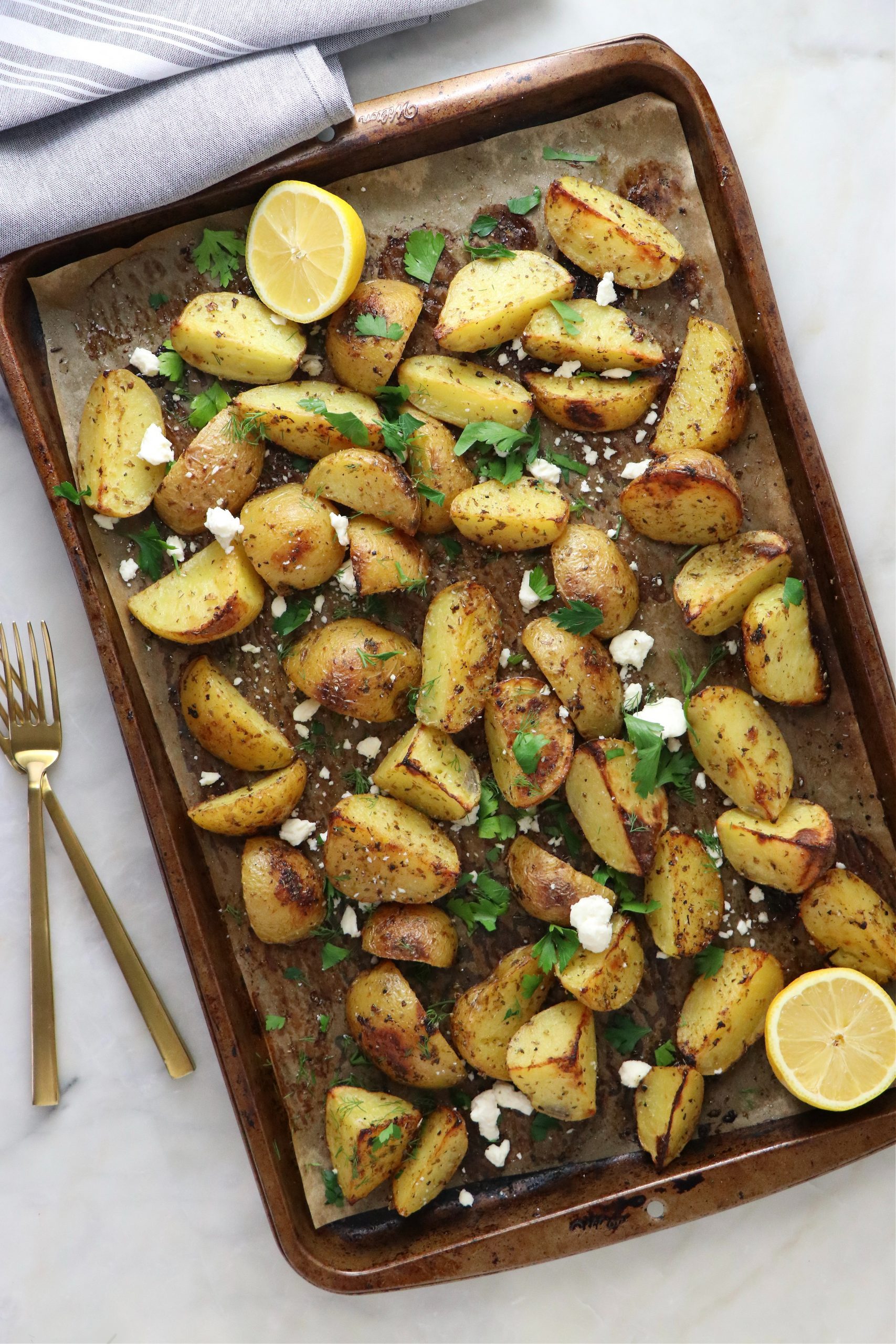 Crispy Greek Style Potatoes with Lemon + Feta
